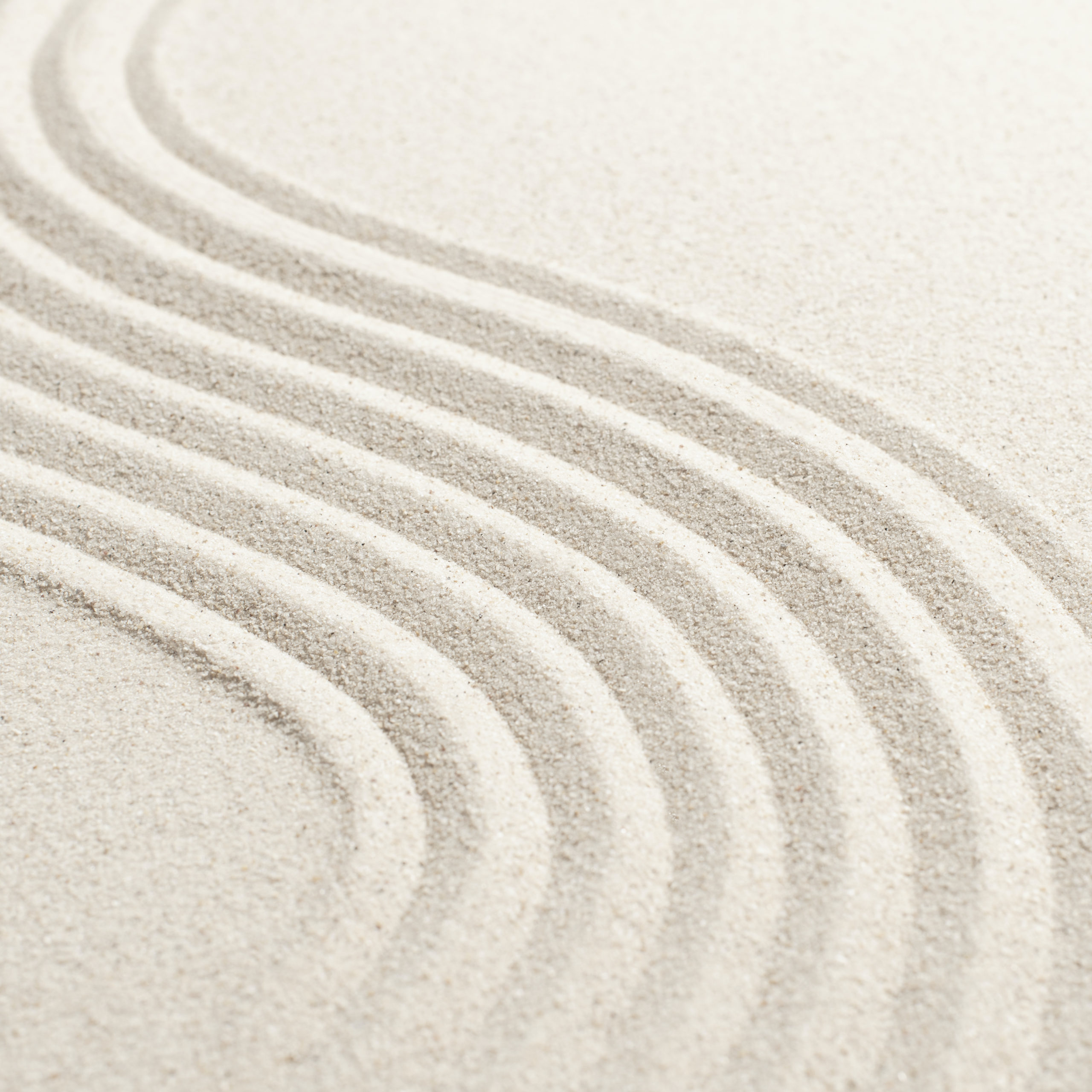 Sand wave nature textured background in wellness concept